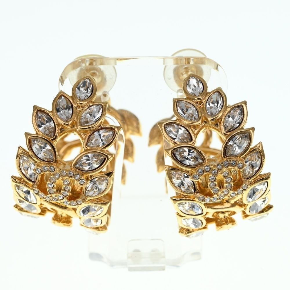 stone CHANEL B22 K Coco Mark CC Gold Plated Earrings With Colored: stone CHANEL B22 K Coco Mark CC Gold Plated Earrings With Colored This listing features stone CHANEL B22 K Coco Mark CC Gold Plated Earrings With Colored. Item specifics are provided below. Item Speci