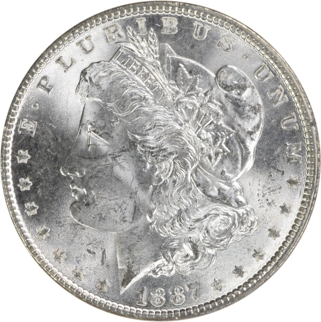 Uncertified 1887 Morgan Silver Dollar BU: Uncertified 1887 Morgan Silver Dollar BU This listing features Uncertified 1887 Morgan Silver Dollar BU. Item specifics are provided below. Item Specifics: Country Of Origin: United States Certificati