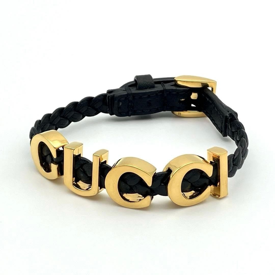 inches Gucci Logo Black Braided Leather Bracelet 7.09: inches Gucci Logo Black Braided Leather Bracelet 7.09 This listing features inches Gucci Logo Black Braided Leather Bracelet 7.09. Item specifics are provided below. Item Specifics: Brand: Gucci Type: