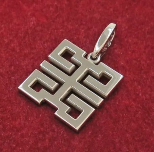 Signed Cartier Wish Knot Dragon 18k White Gold Charm Pendant Necklace Top: Signed Cartier Wish Knot Dragon 18k White Gold Charm Pendant Necklace Top This listing features Signed Cartier Wish Knot Dragon 18k White Gold Charm Pendant Necklace Top. Item specifics are provided b