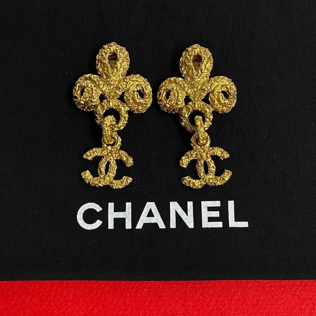 Plated Vintage CHANEL 93A Coco Mark CC Clip-on Dangle Earring 2.56 inches Gold: Plated Vintage CHANEL 93A Coco Mark CC Clip-on Dangle Earring 2.56 inches Gold This listing features Plated Vintage CHANEL 93A Coco Mark CC Clip-on Dangle Earring 2.56 inches Gold. Item specifics are