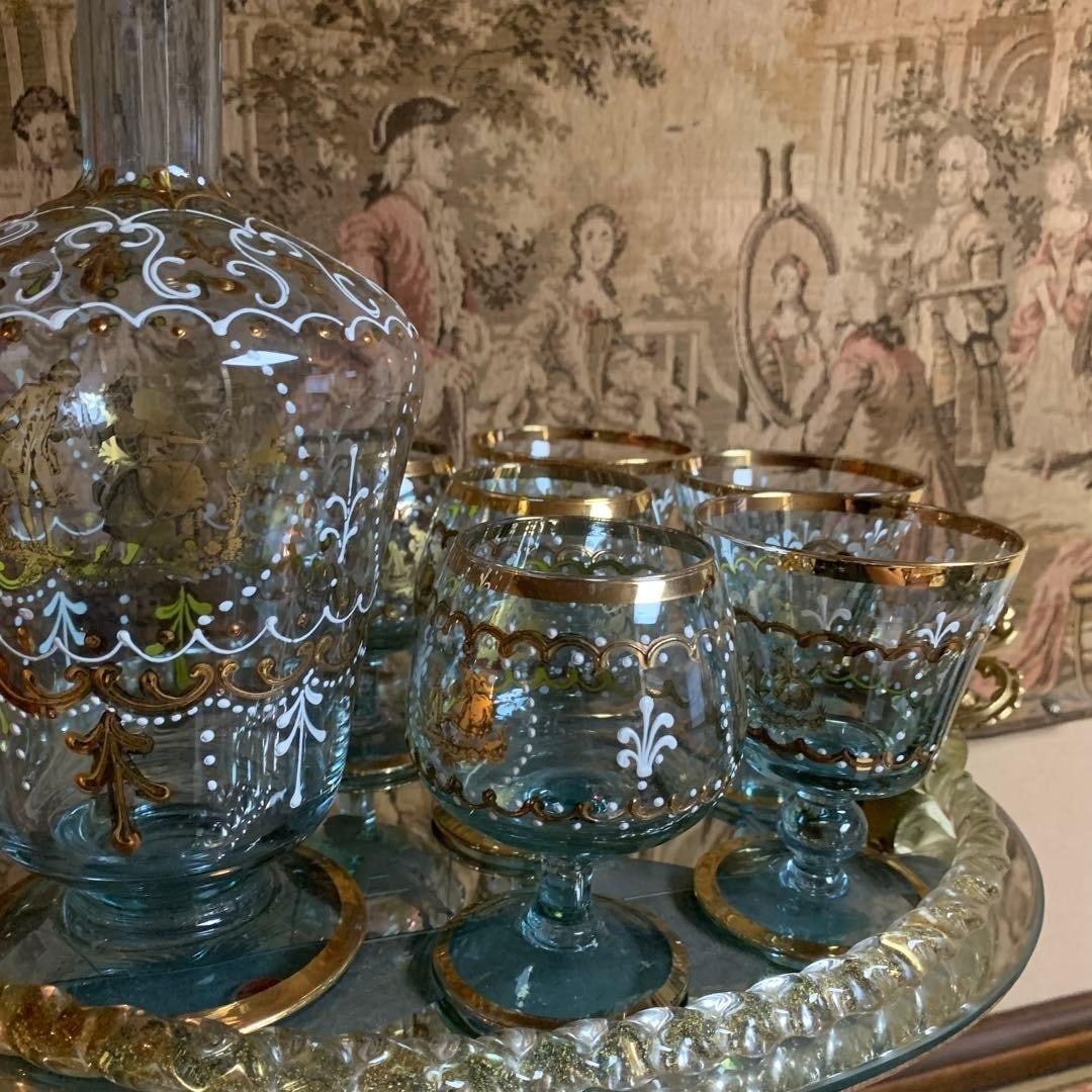 Rare Murano alexandrite glass Goblet Decanter Set Gold Enamel 8 Piece Venetian: Rare Murano alexandrite glass Goblet Decanter Set Gold Enamel 8 Piece Venetian This listing features Rare Murano alexandrite glass Goblet Decanter Set Gold Enamel 8 Piece Venetian. Item specifics are