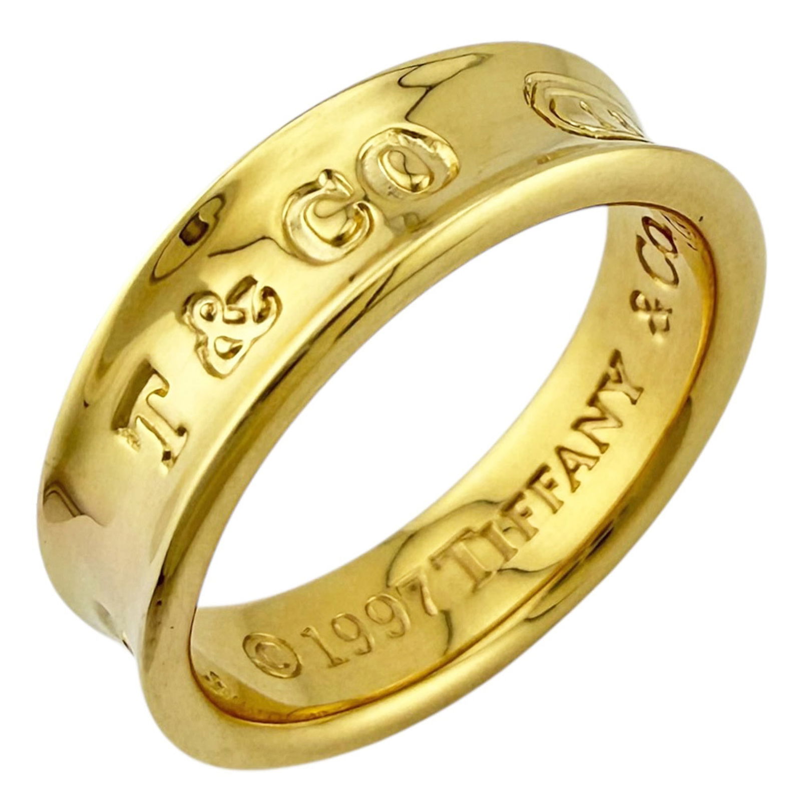 (18K) Tiffany Band Ring Yellow Gold: (18K) Tiffany Band Ring Yellow Gold This listing features (18K) Tiffany Band Ring Yellow Gold. Item specifics are provided below. Item Specifics: Brand: Tiffany Type: Band Ring Gender: Women Color: