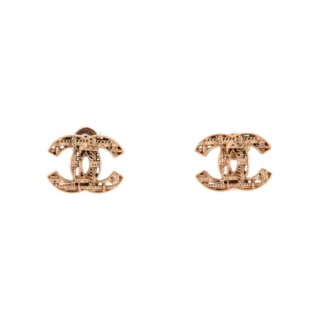 Metal Chanel CC Tweed Effect Stud Earrings: Metal Chanel CC Tweed Effect Stud Earrings This listing features Metal Chanel CC Tweed Effect Stud Earrings. Item specifics are provided below. Item Specifics: Style: Stud Brand: Chanel Type: Earrings