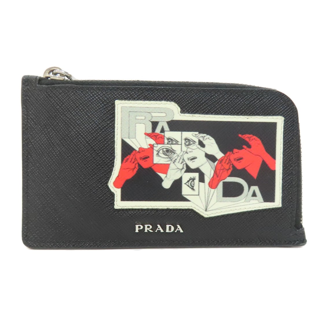 Safiano PRADA Real Life Comics coin purse: Safiano PRADA Real Life Comics coin purse This listing features Safiano PRADA Real Life Comics coin purse. Item specifics are provided below. Item Specifics: Brand: PRADA Style: coin purse Material:
