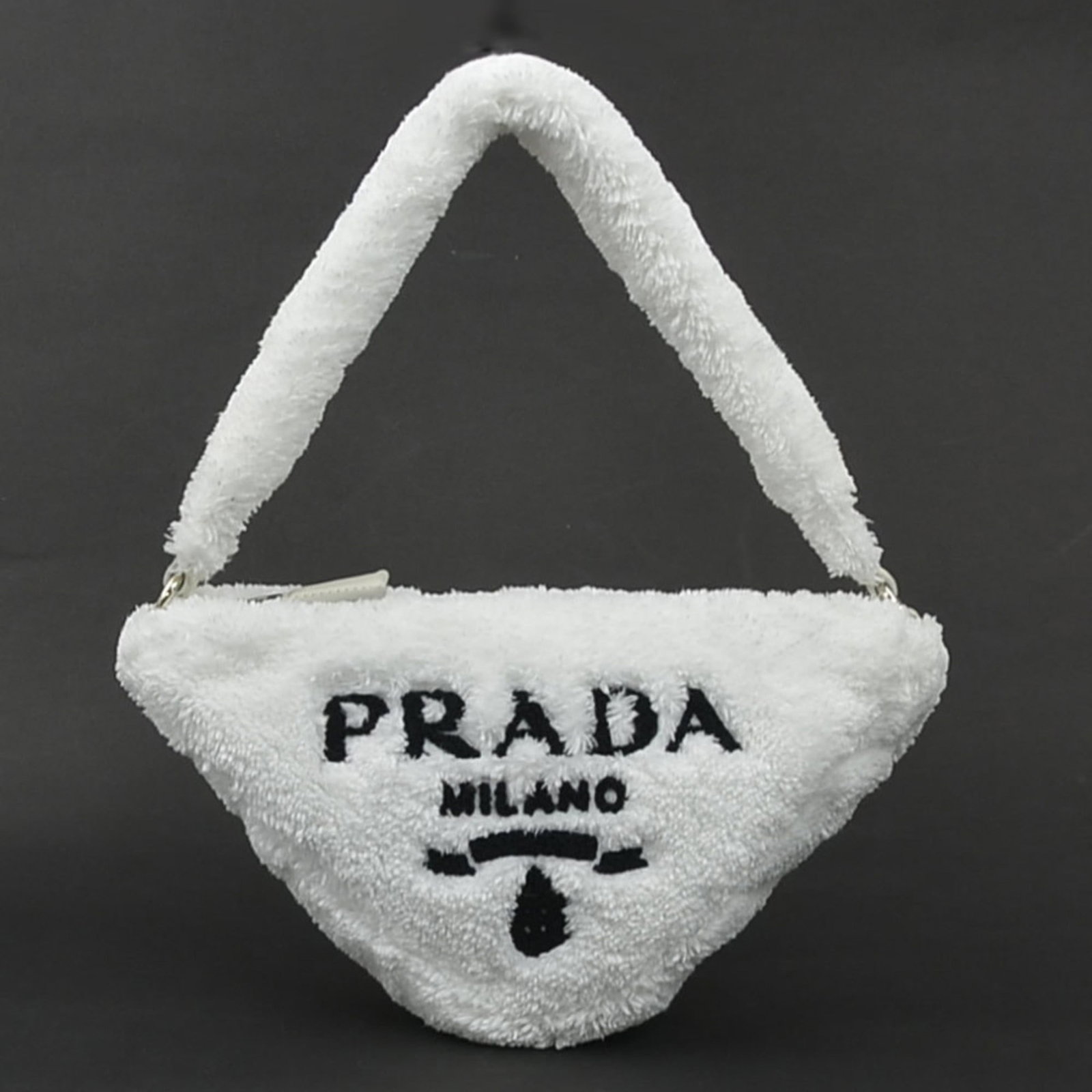 Fabric Prada Handbag Pile: Fabric Prada Handbag Pile This listing features Fabric Prada Handbag Pile. Item specifics are provided below. Item Specifics: Brand: Prada Type: Handbag Material: Pile Fabric Color: White Gender: