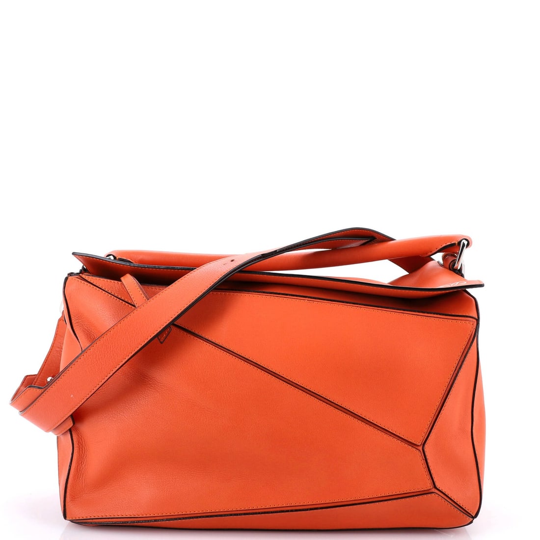 Large Loewe Puzzle Bag Leather: Large Loewe Puzzle Bag Leather This listing features Large Loewe Puzzle Bag Leather. Item specifics are provided below. Item Specifics: Brand: Loewe Exterior Material: Leather Style: Satchels