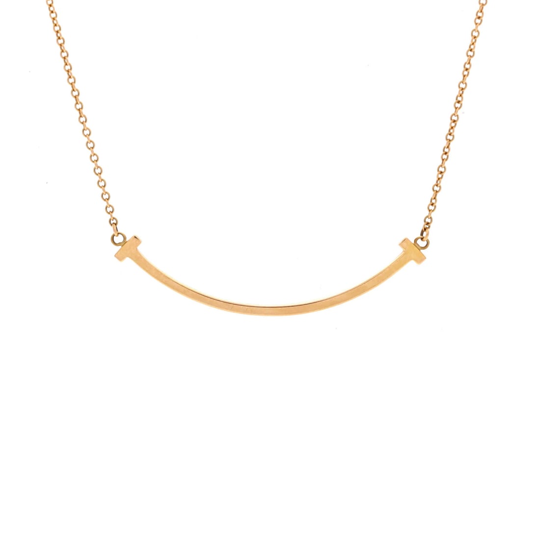 Small Tiffany & Co. T Smile Pendant Necklace 18K Yellow Gold: Small Tiffany & Co. T Smile Pendant Necklace 18K Yellow Gold This listing features Small Tiffany & Co. T Smile Pendant Necklace 18K Yellow Gold. Item specifics are provided below. Item Specifics: