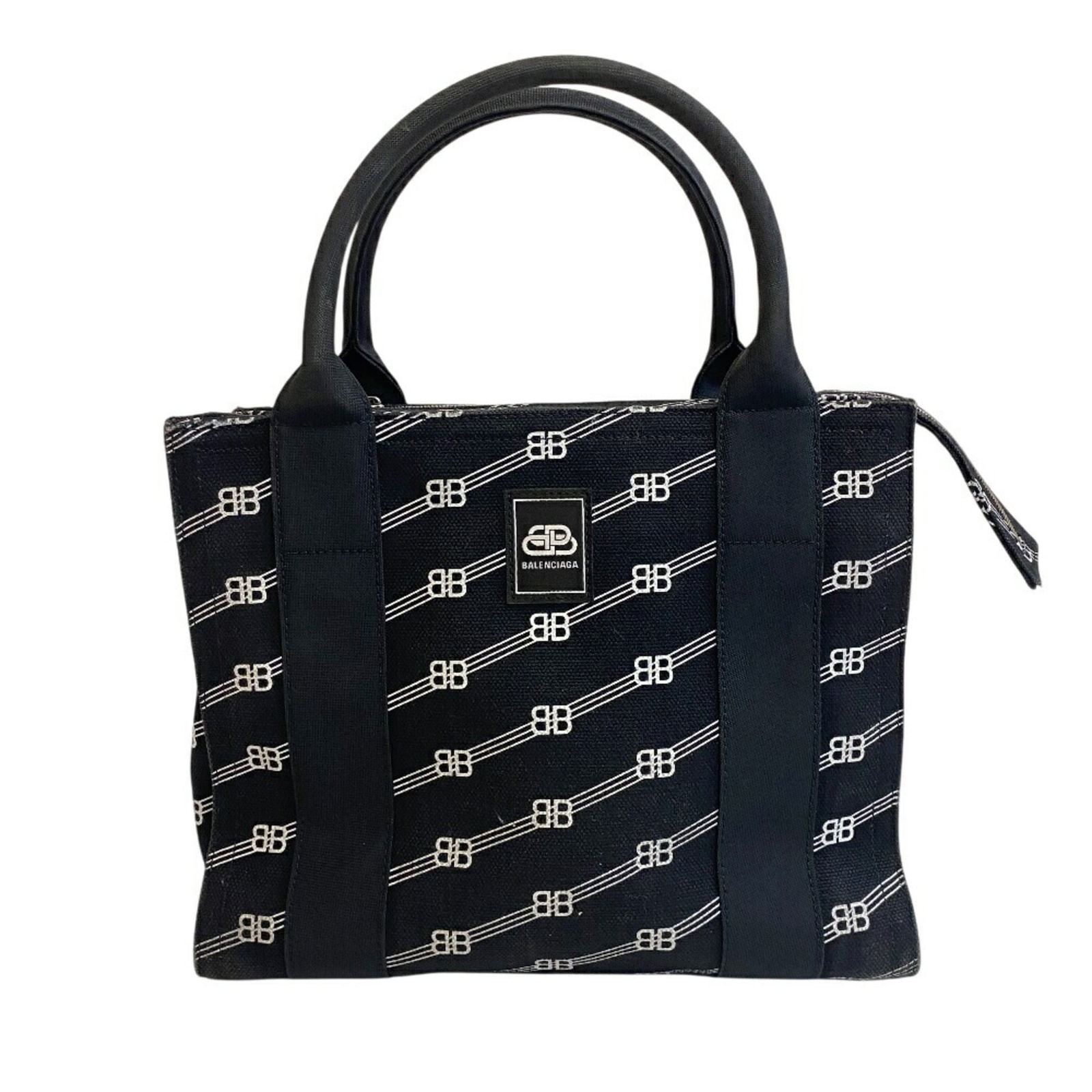 Canvas Balenciaga Handbag: Canvas Balenciaga Handbag This listing features Canvas Balenciaga Handbag. Item specifics are provided below. Item Specifics: Brand: Balenciaga Type: Handbag Material: Canvas Color: Black Gender: Wome