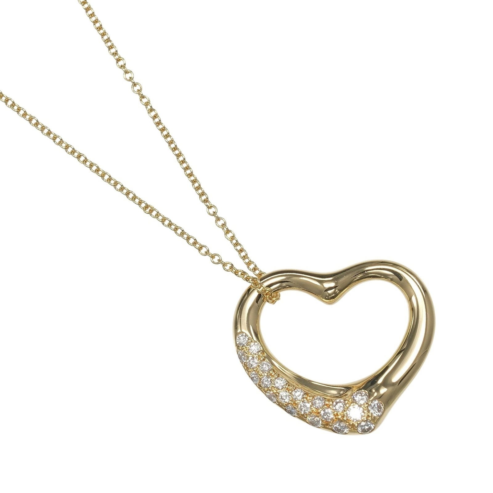 Approx. 7.86g - Tiffany & Co. Open Heart Necklace in 18K Yellow Gold with Diamonds: Approx. 7.86g - Tiffany & Co. Open Heart Necklace in 18K Yellow Gold with Diamonds This listing features Approx. 7.86g - Tiffany & Co. Open Heart Necklace in 18K Yellow Gold with Diamonds. Item