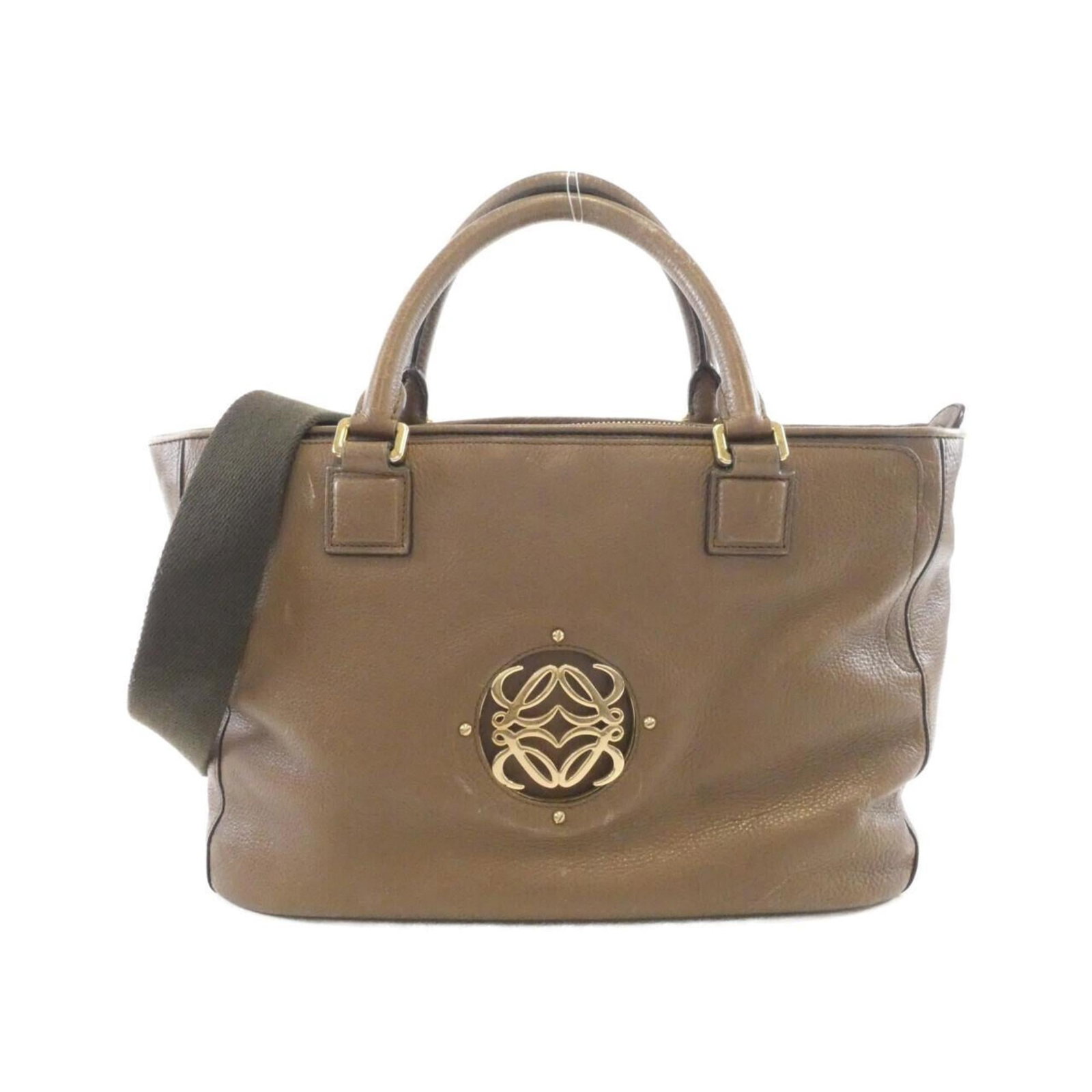 Leather Loewe Handbag: Leather Loewe Handbag This listing features Leather Loewe Handbag. Item specifics are provided below. Item Specifics: Brand: Loewe Type: Handbag Material: Leather Color: Brown Gender: Women Size (Hxwx