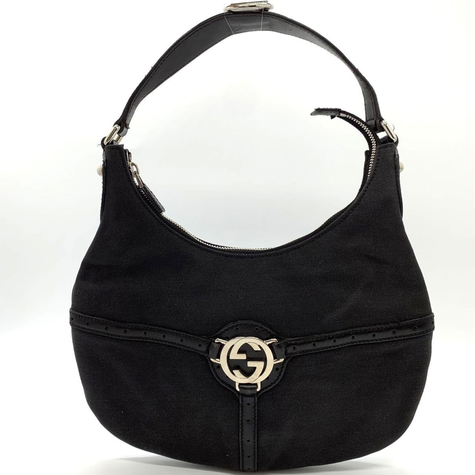 Leather - Gucci Handbag Canvas: Leather - Gucci Handbag Canvas This listing features Leather - Gucci Handbag Canvas. Item specifics are provided below. Item Specifics: Brand: Gucci Type: Handbag Material: Canvas , Leather Color: Bla