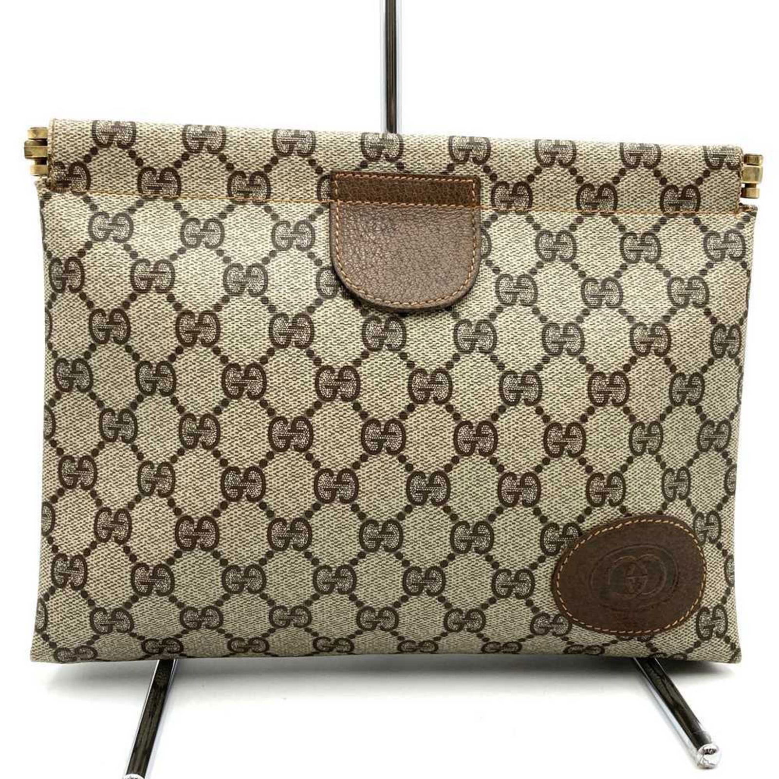 Supreme Gucci Clutch Bag Gg: Supreme Gucci Clutch Bag Gg This listing features Supreme Gucci Clutch Bag Gg. Item specifics are provided below. Item Specifics: Brand: Gucci Type: Clutch Bag Material: Gg Supreme Color: Brown Closur