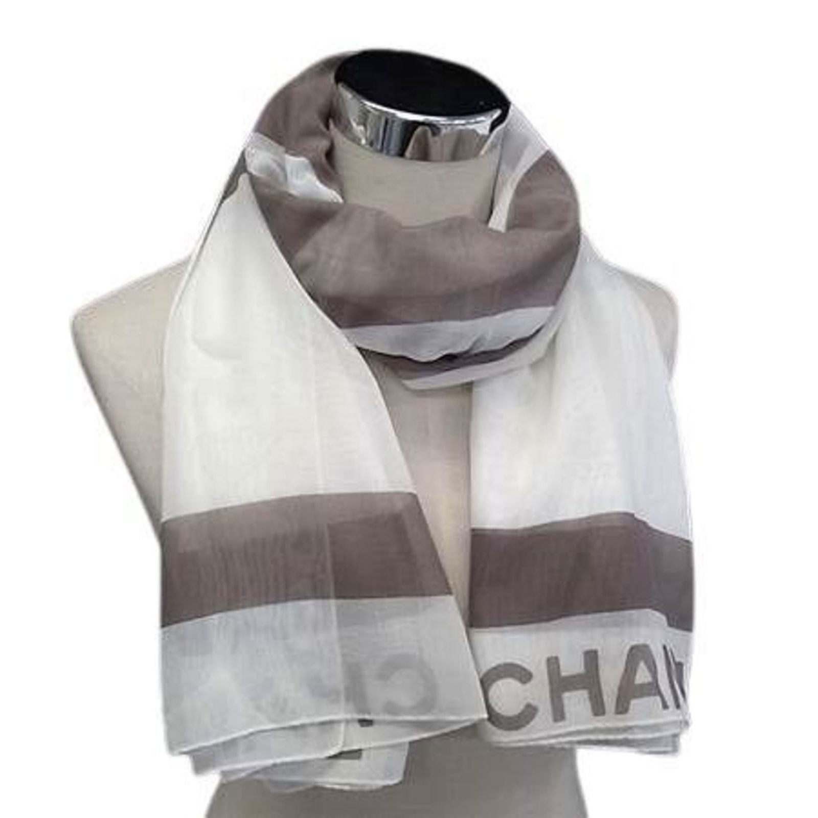100% Chanel Stole Cotton: 100% Chanel Stole Cotton This listing features 100% Chanel Stole Cotton. Item specifics are provided below. Item Specifics: Brand: Chanel Type: Stole Gender: Women Color: Gray, White Material: