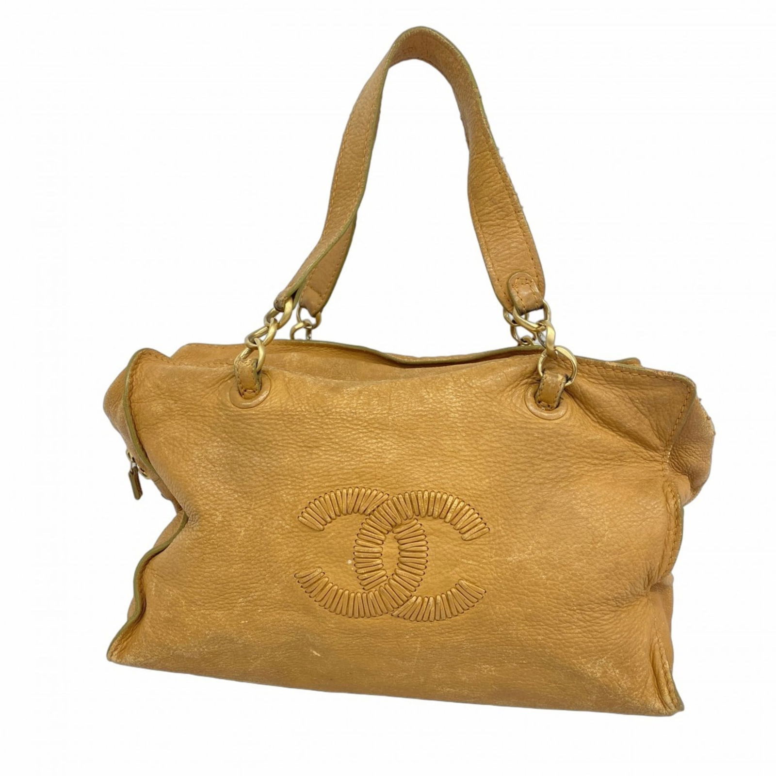 Leather Chanel Handbag: Leather Chanel Handbag This listing features Leather Chanel Handbag. Item specifics are provided below. Item Specifics: Brand: Chanel Type: Handbag Material: Leather Color: Beige Hardware Color: