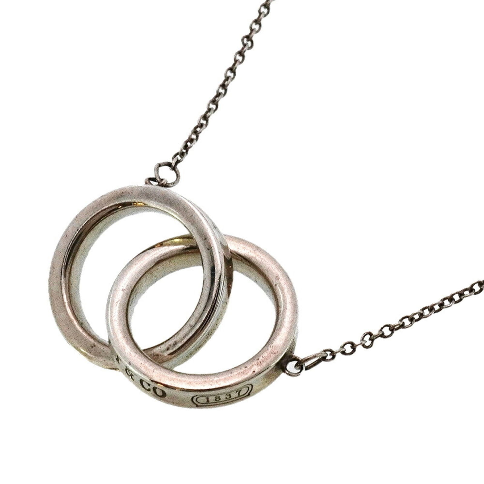 Women Tiffany Interlocking Necklace in Silver 925 for: Women Tiffany Interlocking Necklace in Silver 925 for This listing features Women Tiffany Interlocking Necklace in Silver 925 for. Item specifics are provided below. Item Specifics: Brand: Tiffany