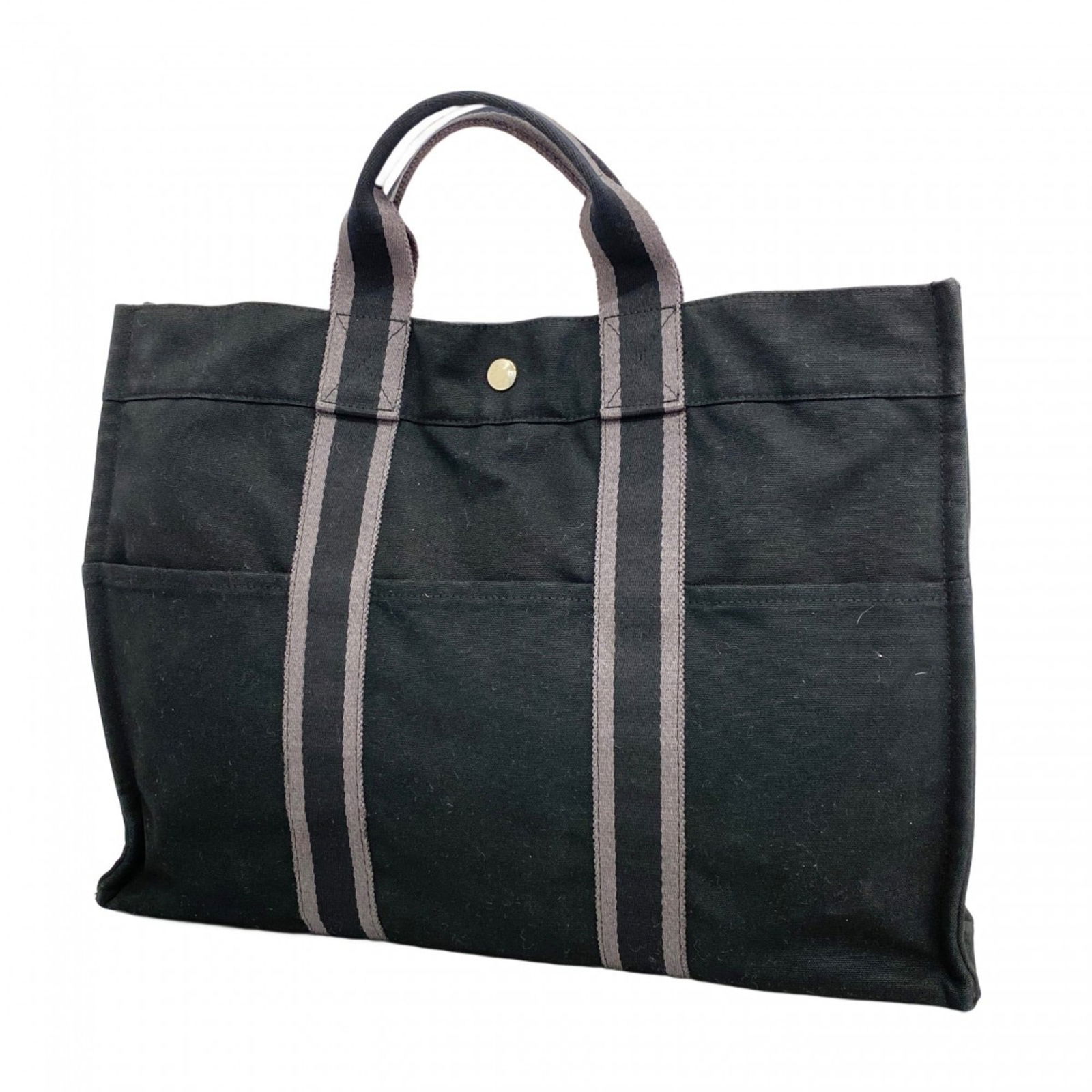 Canvas Hermes Tote Bag: Canvas Hermes Tote Bag This listing features Canvas Hermes Tote Bag. Item specifics are provided below. Item Specifics: Brand: Hermes Type: Tote Bag Material: Canvas Color: Black, Gray Hardware