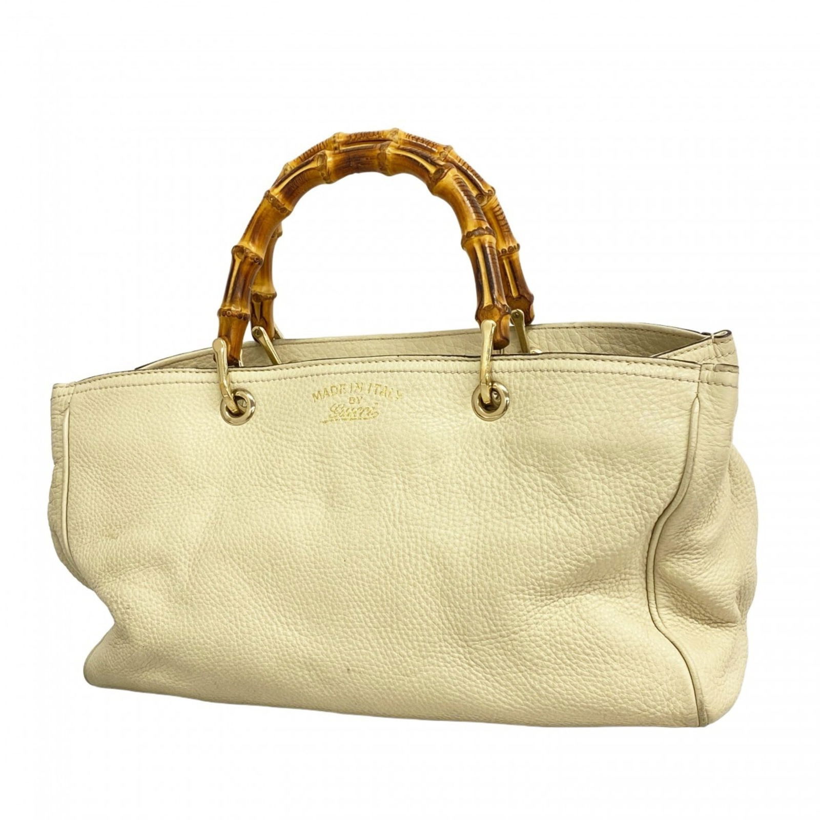 Leather Gucci Handbag: Leather Gucci Handbag This listing features Leather Gucci Handbag. Item specifics are provided below. Item Specifics: Brand: Gucci Type: Handbag Material: Leather Color: Ivory Hardware Color: Gold Gen