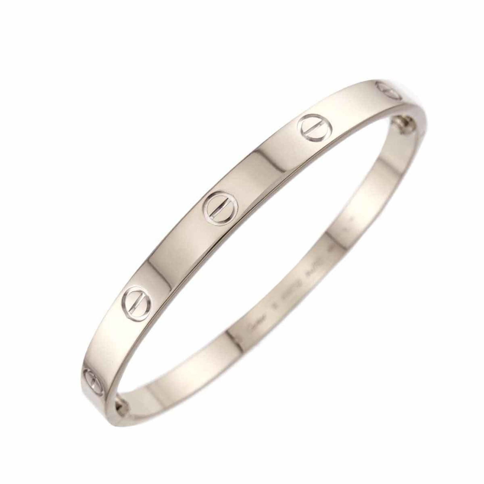 (18K) Cartier Charm Bracelet White Gold: (18K) Cartier Charm Bracelet White Gold This listing features (18K) Cartier Charm Bracelet White Gold. Item specifics are provided below. Item Specifics: Brand: Cartier Type: Charm Bracelet Gender: