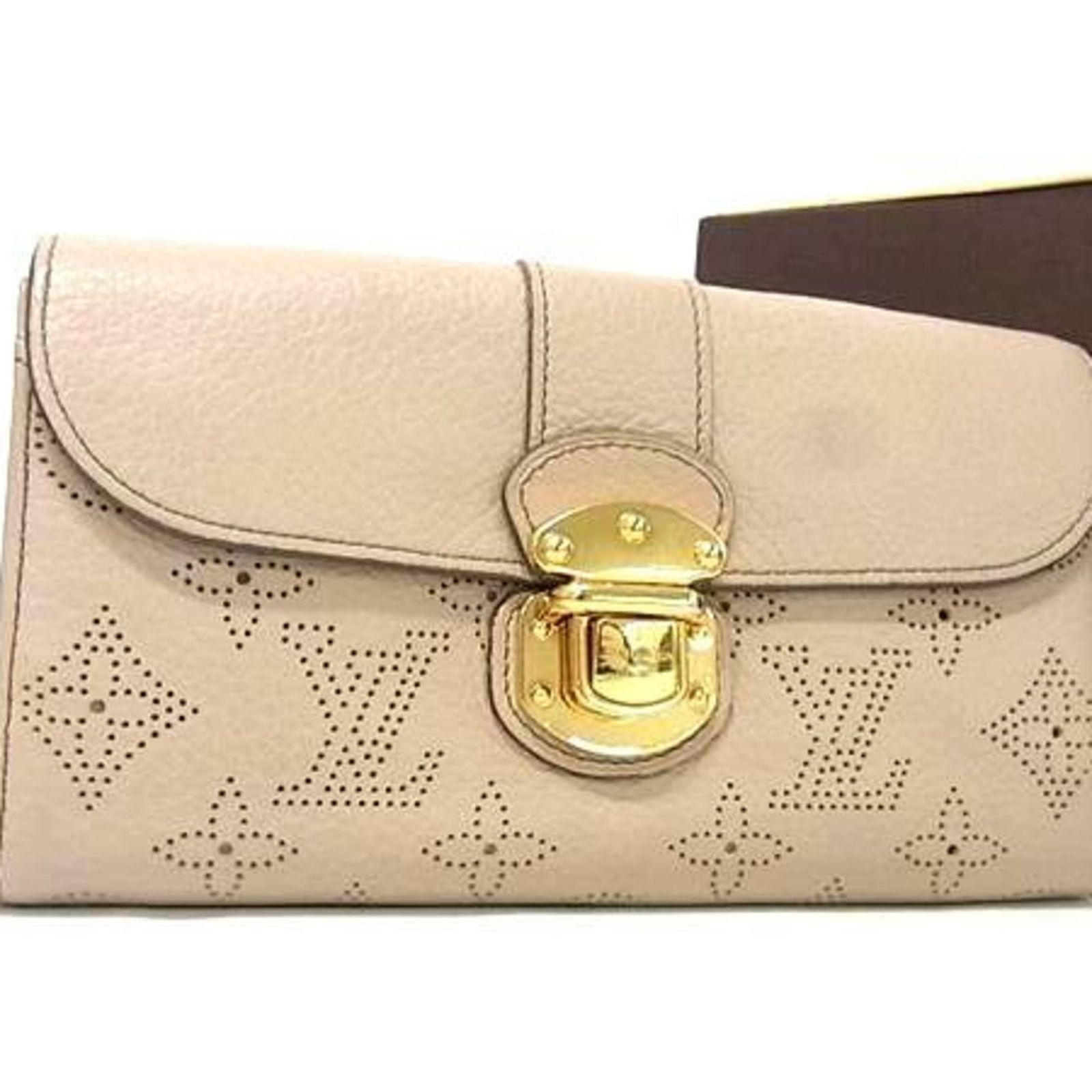 Leather Louis Vuitton Long Wallet (Bi-Fold) Mahina: Leather Louis Vuitton Long Wallet (Bi-Fold) Mahina This listing features Leather Louis Vuitton Long Wallet (Bi-Fold) Mahina. Item specifics are provided below. Item Specifics: Brand: Louis Vuitton Typ