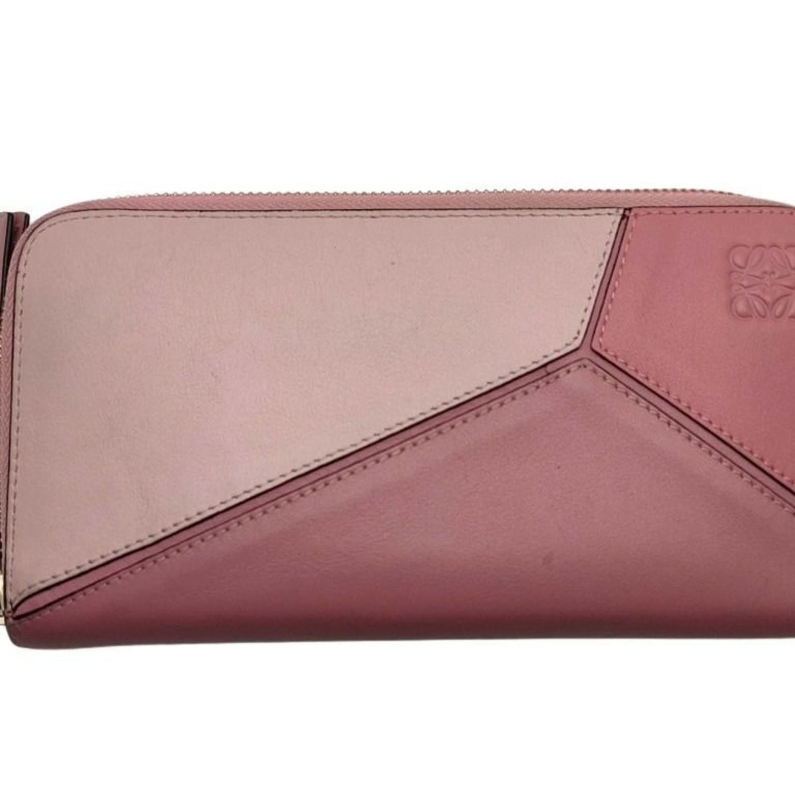 Leather Loewe Long Wallet (Bi-Fold): Leather Loewe Long Wallet (Bi-Fold) This listing features Leather Loewe Long Wallet (Bi-Fold). Item specifics are provided below. Item Specifics: Brand: Loewe Type: Long Wallet (Bi-Fold) Gender: Women