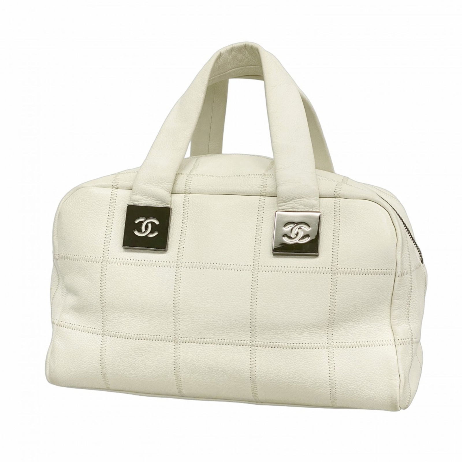 Leather Chanel Handbag: Leather Chanel Handbag This listing features Leather Chanel Handbag. Item specifics are provided below. Item Specifics: Brand: Chanel Type: Handbag Material: Leather Color: White Hardware Color: Silve