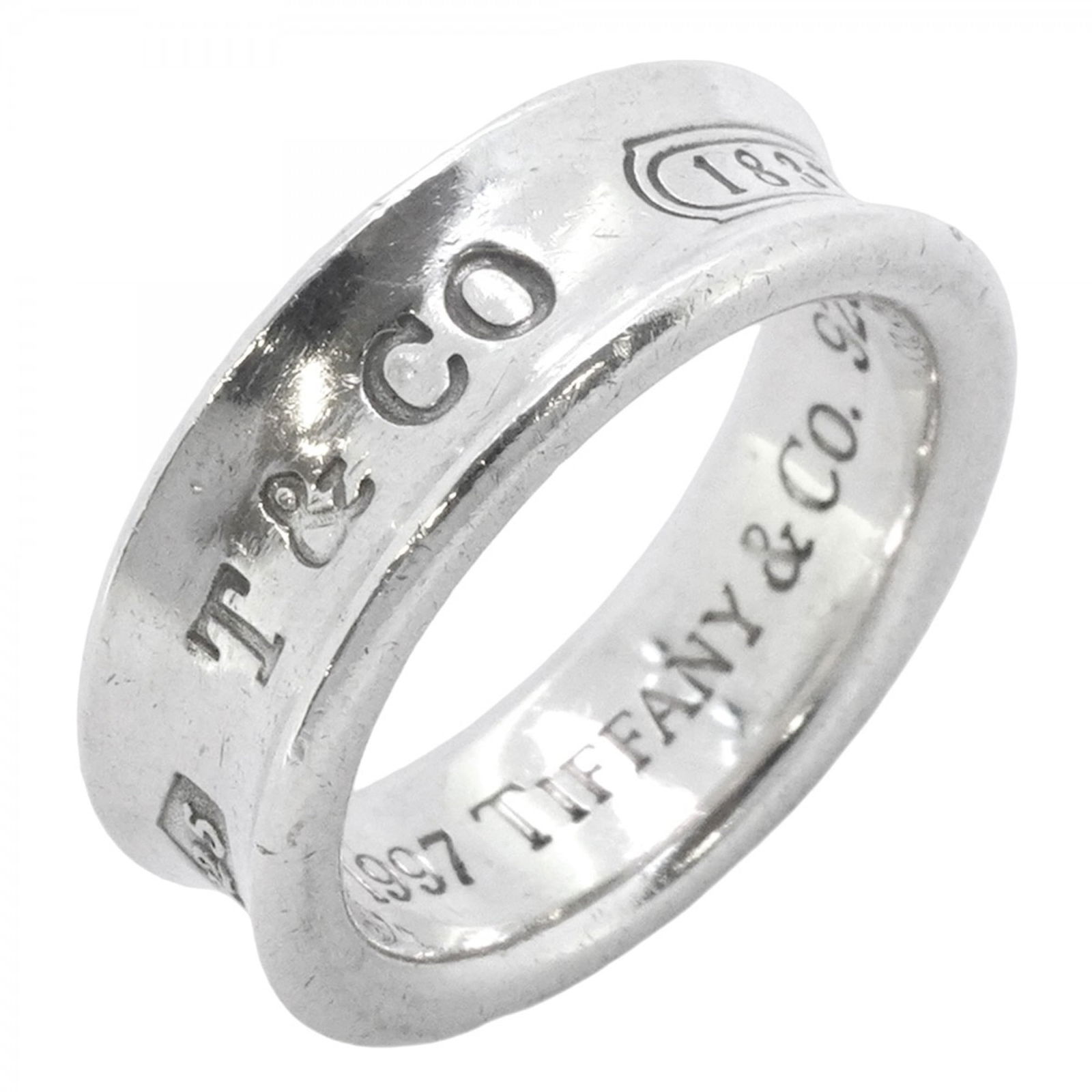 925 Tiffany Band Ring Silver: 925 Tiffany Band Ring Silver This listing features 925 Tiffany Band Ring Silver. Item specifics are provided below. Item Specifics: Brand: Tiffany Type: Band Ring Gender: Women Material: Silver 925