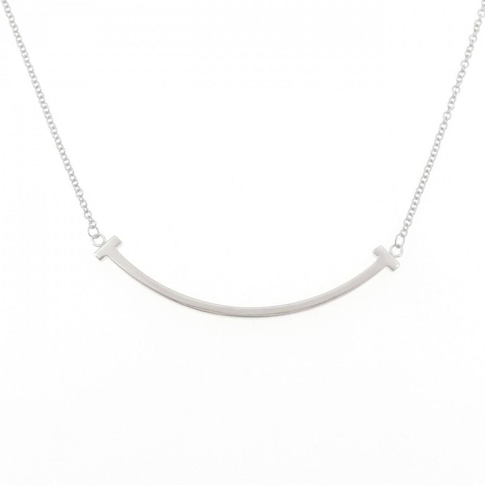 Necklace Tiffany T Smile Small: Necklace Tiffany T Smile Small This listing features Necklace Tiffany T Smile Small. Item specifics are provided below. Item Specifics: Brand: Tiffany Necklace Type: Necklace Pendant Type: Pendant