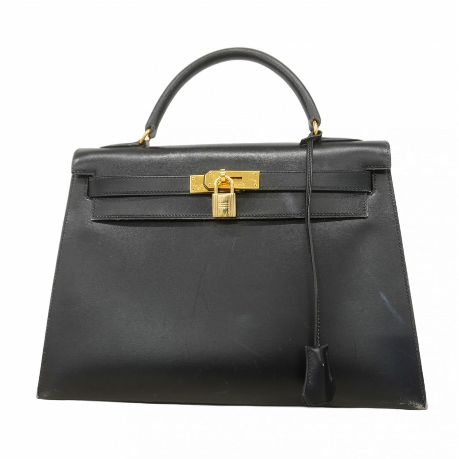 Leather Hermes Handbag Box Calf: Leather Hermes Handbag Box Calf This listing features Leather Hermes Handbag Box Calf. Item specifics are provided below. Item Specifics: Brand: Hermes Type: Handbag Material: Box Calf Leather