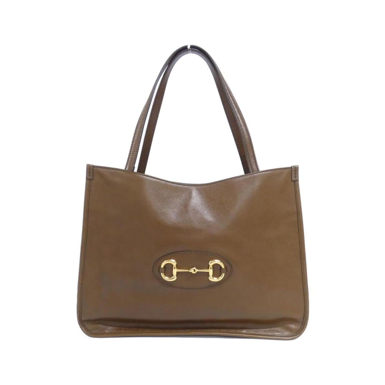 Leather Gucci Handbag: Leather Gucci Handbag This listing features Leather Gucci Handbag. Item specifics are provided below. Item Specifics: Brand: Gucci Type: Handbag Material: Leather Color: Brown Gender: Women Size
