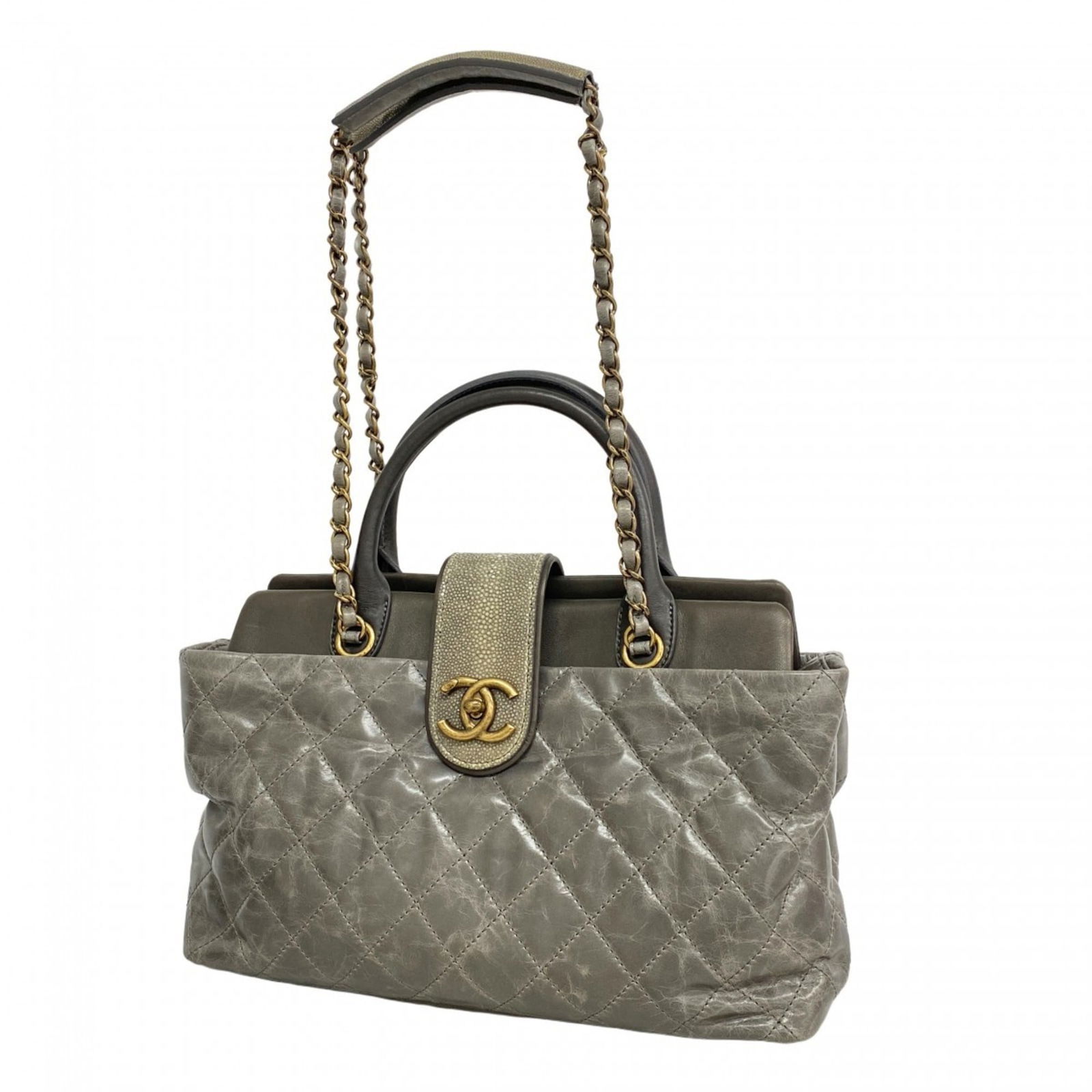 Leather Chanel Handbag: Leather Chanel Handbag This listing features Leather Chanel Handbag. Item specifics are provided below. Item Specifics: Brand: Chanel Type: Handbag Material: Leather Color: Gray Hardware Color: Gold