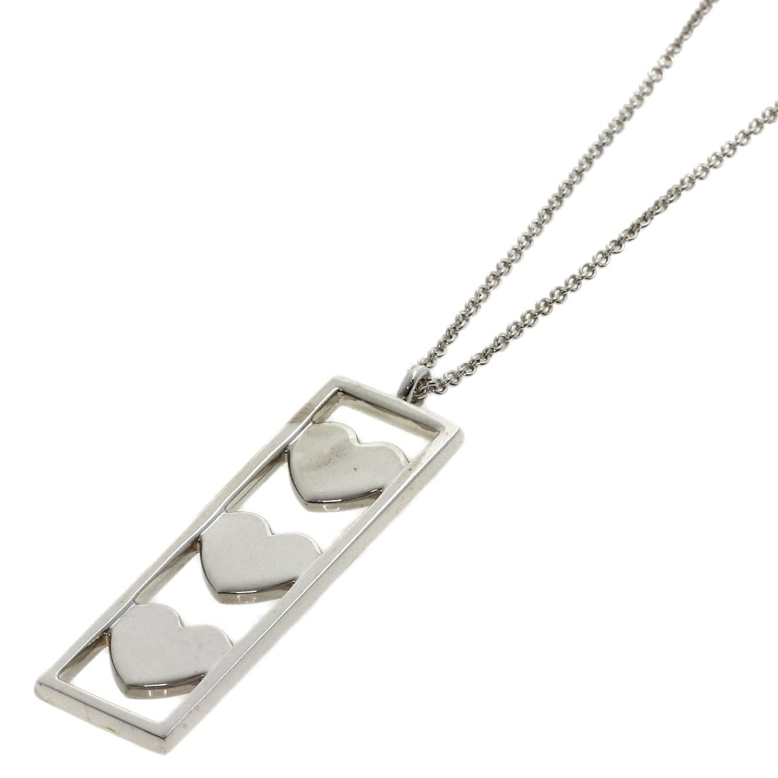 Silver TIFFANY&Co. triple heart plate Necklace: Silver TIFFANY&Co. triple heart plate Necklace This listing features Silver TIFFANY&Co. triple heart plate Necklace. Item specifics are provided below. Item Specifics: Brand: TIFFANY&Co. Style: Neckla