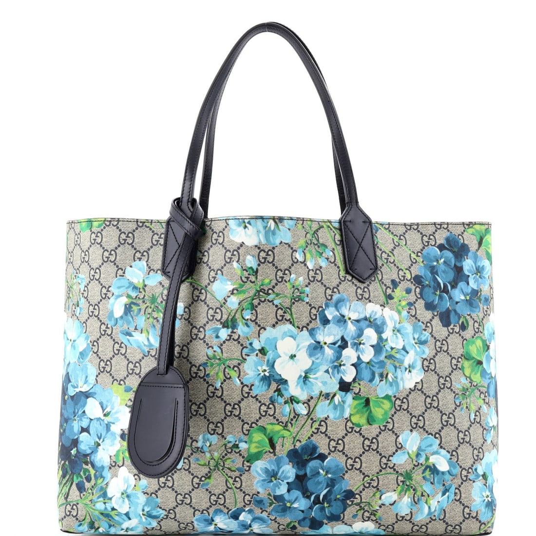 Medium Gucci Reversible Tote Blooms GG Print Leather: Medium Gucci Reversible Tote Blooms GG Print Leather This listing features Medium Gucci Reversible Tote Blooms GG Print Leather. Item specifics are provided below. Item Specifics: Brand: Gucci Exterio
