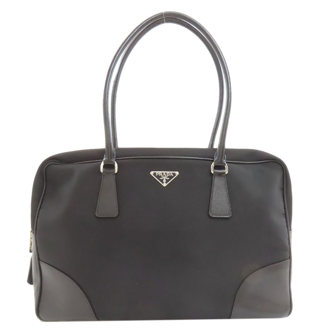 Nylon PRADA Logo Hardware Tote Bag: Nylon PRADA Logo Hardware Tote Bag This listing features Nylon PRADA Logo Hardware Tote Bag. Item specifics are provided below. Item Specifics: Brand: PRADA Style: Tote Bag Exterior Material: Nylon Ex