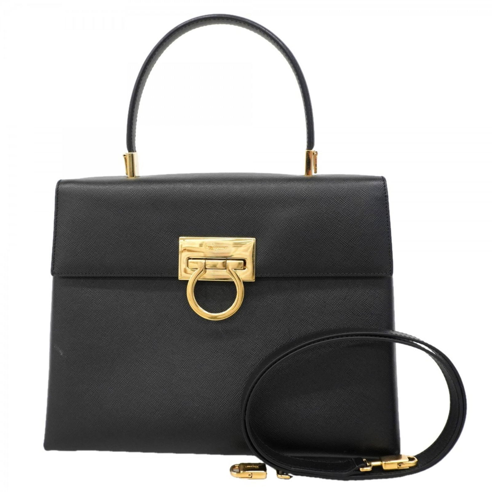 Leather Salvatore Ferragamo Handbag: Leather Salvatore Ferragamo Handbag This listing features Leather Salvatore Ferragamo Handbag. Item specifics are provided below. Item Specifics: Brand: Salvatore Ferragamo Type: Handbag Material: