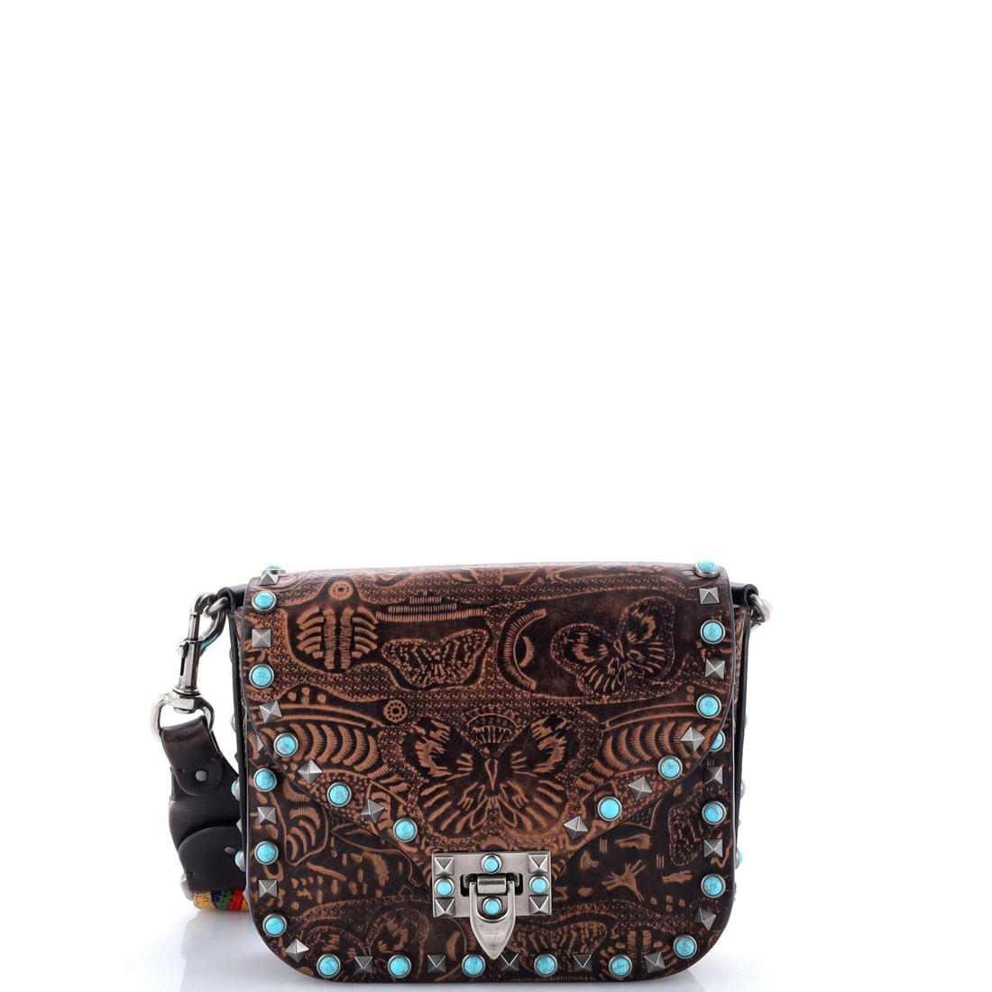 Leather Valentino Garavani Rolling Rockstud Crossbody Bag Santeria Embossed: Leather Valentino Garavani Rolling Rockstud Crossbody Bag Santeria Embossed This listing features Leather Valentino Garavani Rolling Rockstud Crossbody Bag Santeria Embossed. Item specifics are provid