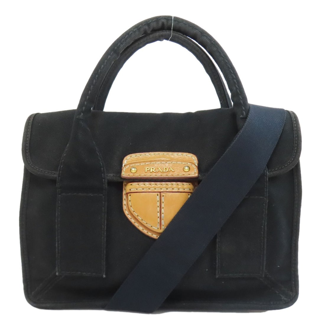 Canvas PRADA logo Handbag: Canvas PRADA logo Handbag This listing features Canvas PRADA logo Handbag. Item specifics are provided below. Item Specifics: Brand: PRADA Style: Handbag Exterior Material: Canvas Exterior Color: