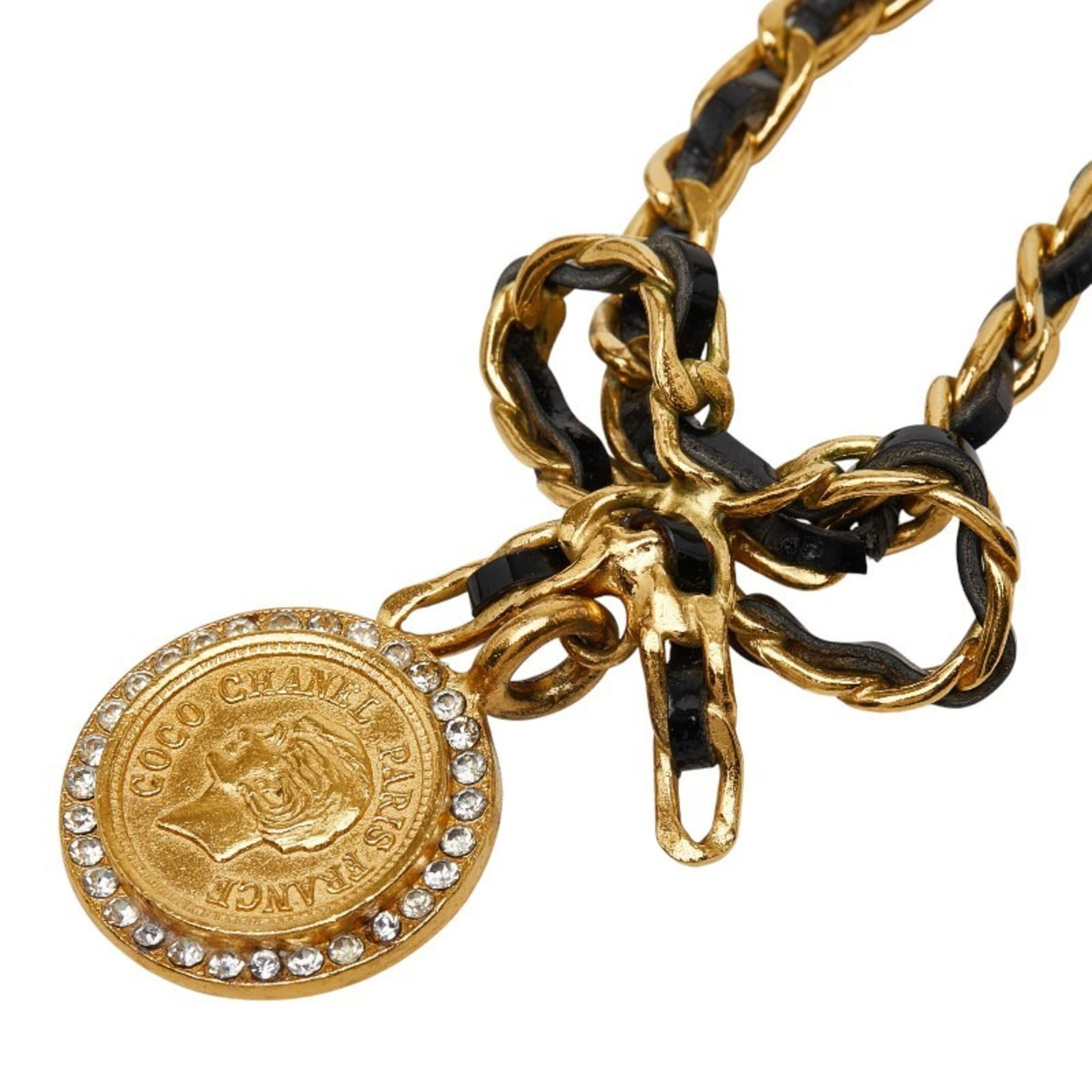 Women. Vintage Chanel Coin Ribbon Necklace in Gold and Black Plated Leather with Rhinestones for: Women. Vintage Chanel Coin Ribbon Necklace in Gold and Black Plated Leather with Rhinestones for This listing features Women. Vintage Chanel Coin Ribbon Necklace in Gold and Black Plated Leather with
