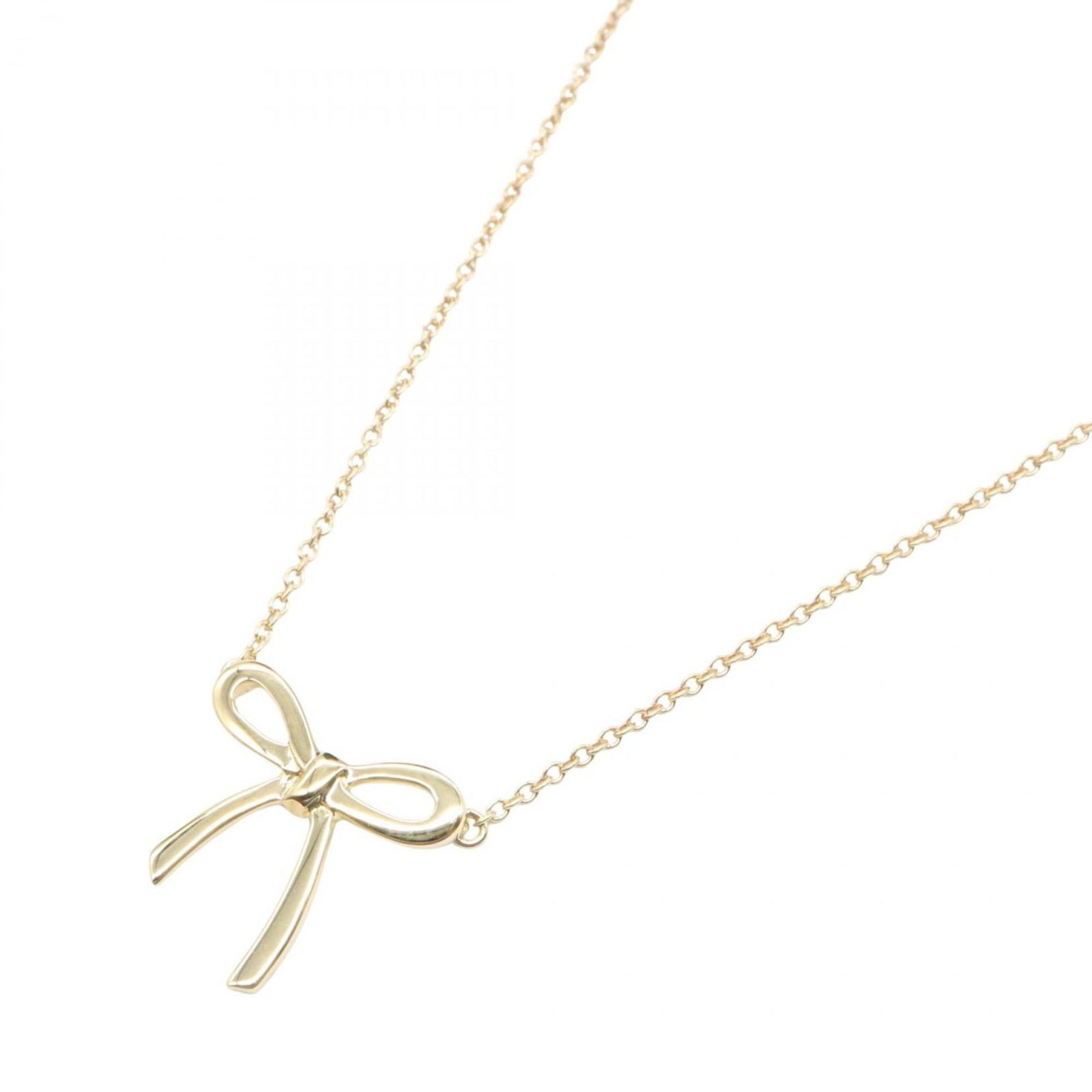 Gold - Tiffany & Co. Ribbon Necklace - 18K Yellow Gold - Women's: Gold - Tiffany & Co. Ribbon Necklace - 18K Yellow Gold - Women's This listing features Gold - Tiffany & Co. Ribbon Necklace - 18K Yellow Gold - Women's. Item specifics are provided below. Item