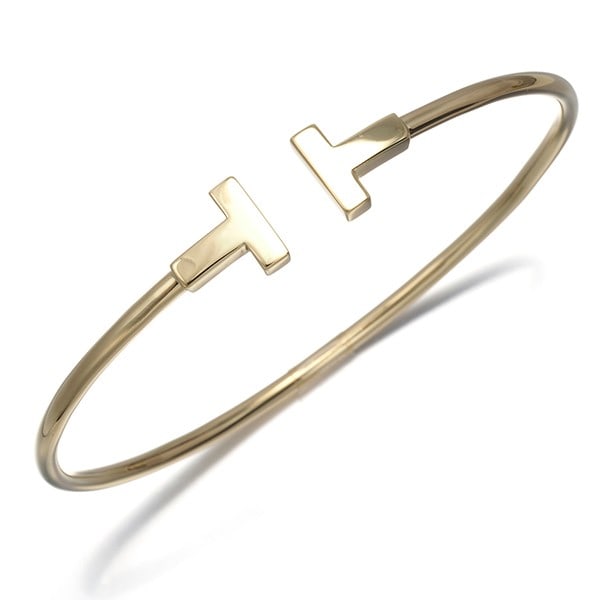 Gold Tiffany&Co. Bracelet Tiffany T Wire Bangle 18K 750 Yellow: Gold Tiffany&Co. Bracelet Tiffany T Wire Bangle 18K 750 Yellow This listing features Gold Tiffany&Co. Bracelet Tiffany T Wire Bangle 18K 750 Yellow. Item specifics are provided below. Item Specifics: