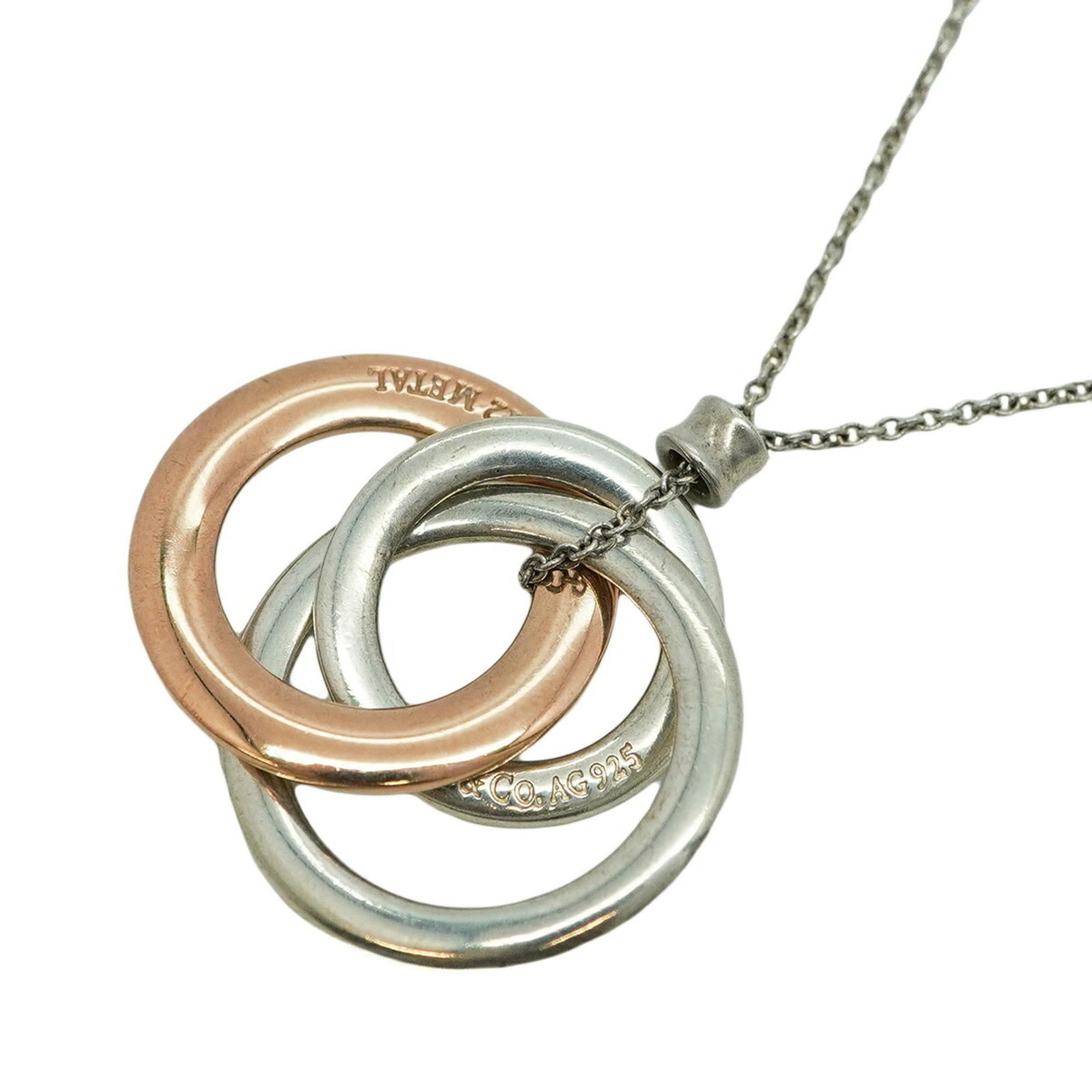 Women Tiffany Interlocking Circle Necklace in 925 Sterling Silver and Rubedo Metal for: Women Tiffany Interlocking Circle Necklace in 925 Sterling Silver and Rubedo Metal for This listing features Women Tiffany Interlocking Circle Necklace in 925 Sterling Silver and Rubedo Metal for.
