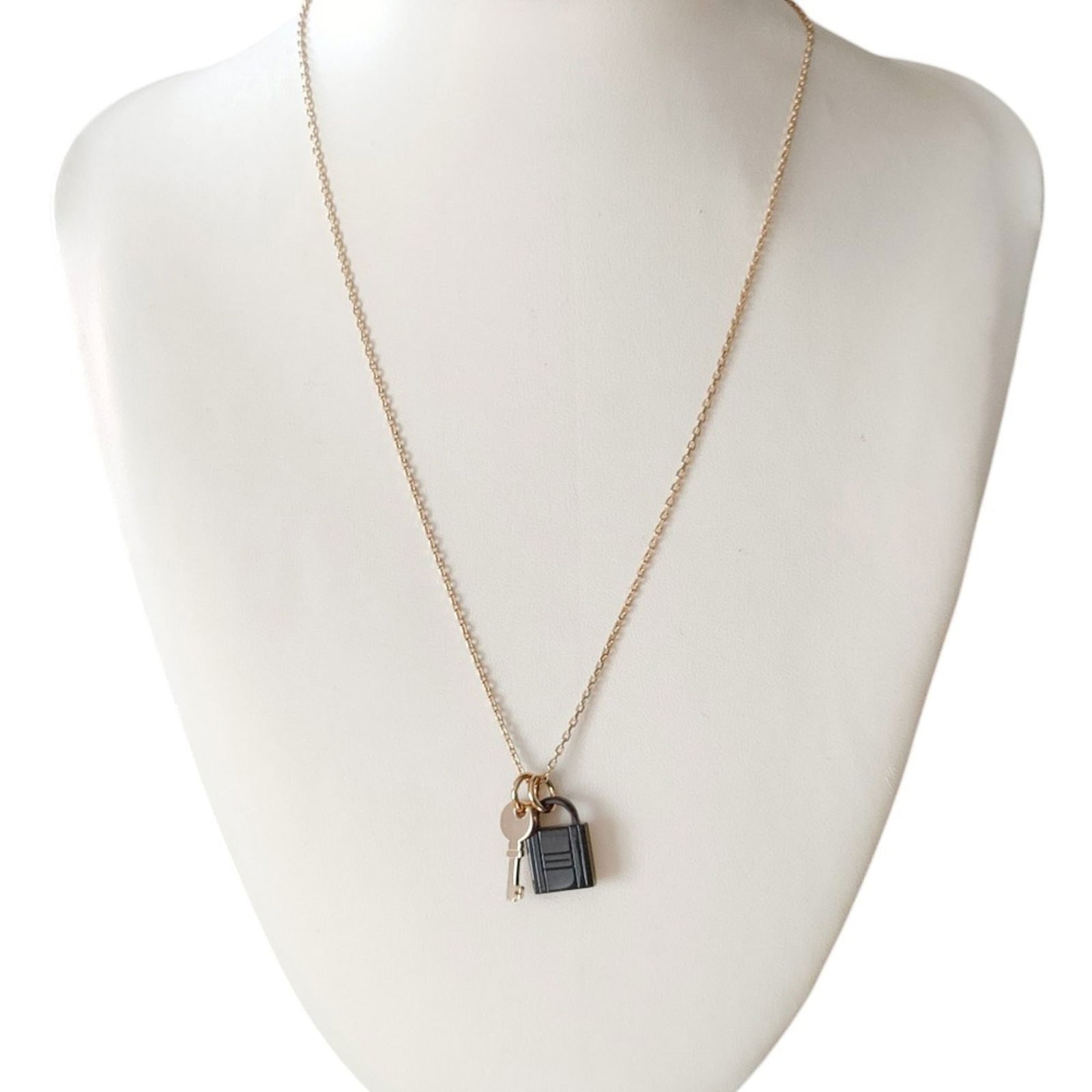 Brands. HERMES Amulet Padlock PM Chain Necklace in Gold and Black for Women. Luxs Pre-owned: Brands. HERMES Amulet Padlock PM Chain Necklace in Gold and Black for Women. Luxs Pre-owned This listing features Brands. HERMES Amulet Padlock PM Chain Necklace in Gold and Black for Women. Luxs