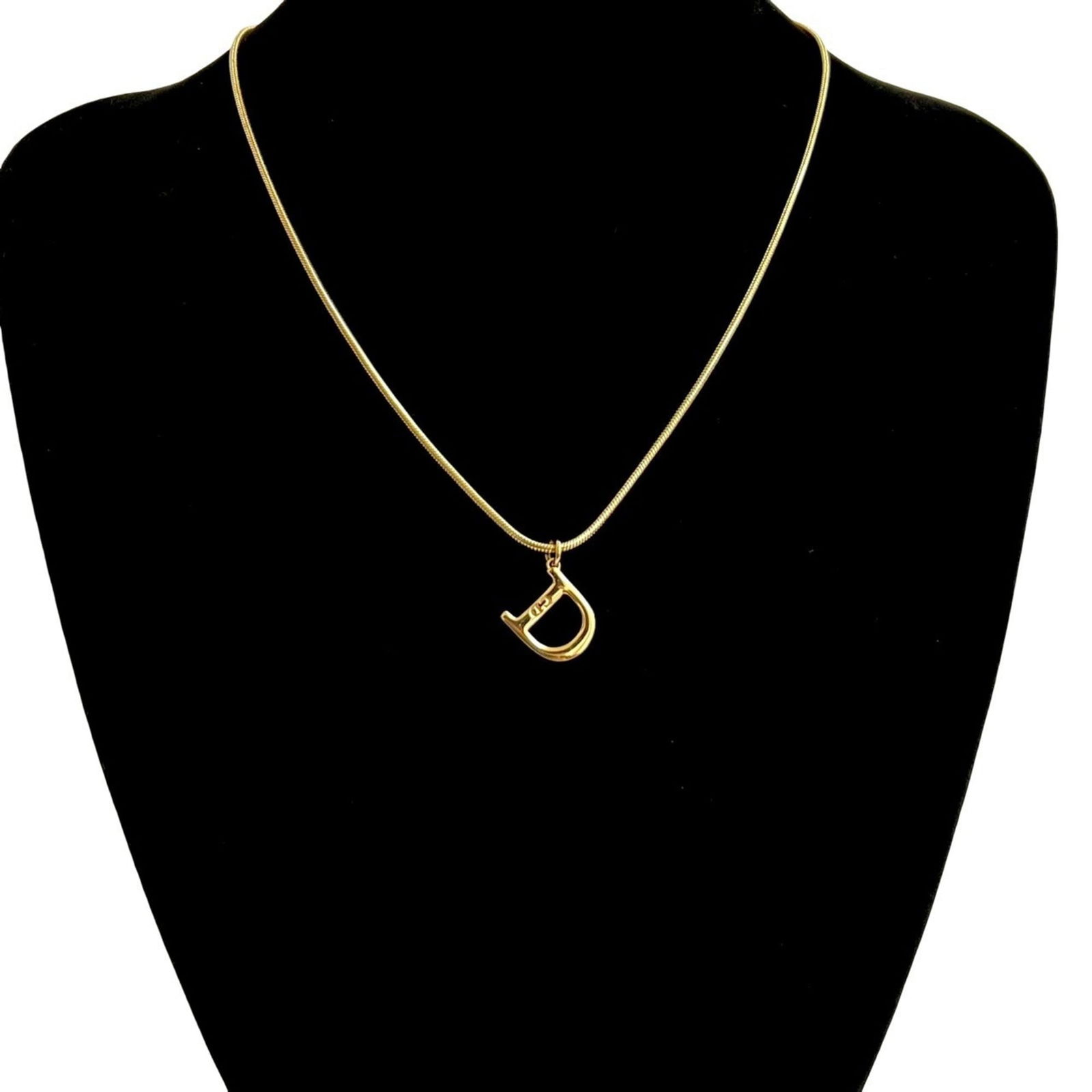 267-2 Christian Dior CD Logo GP Necklace Pendant Choker Gold: 267-2 Christian Dior CD Logo GP Necklace Pendant Choker Gold This listing features 267-2 Christian Dior CD Logo GP Necklace Pendant Choker Gold. Item specifics are provided below. Item Specifics: