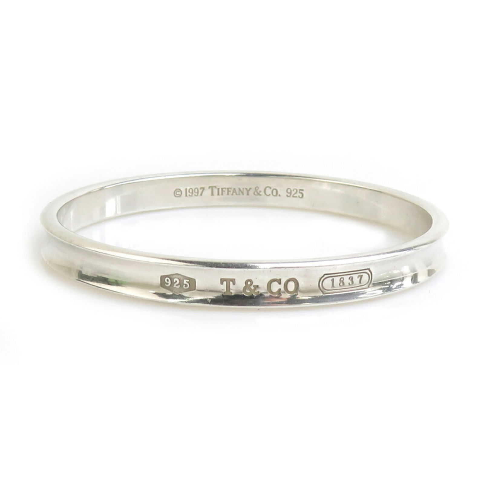 925 Tiffany Bangle Silver: 925 Tiffany Bangle Silver This listing features 925 Tiffany Bangle Silver. Item specifics are provided below. Item Specifics: Brand: Tiffany Type: Bangle Gender: Women Material: Silver 925 Color: Silv