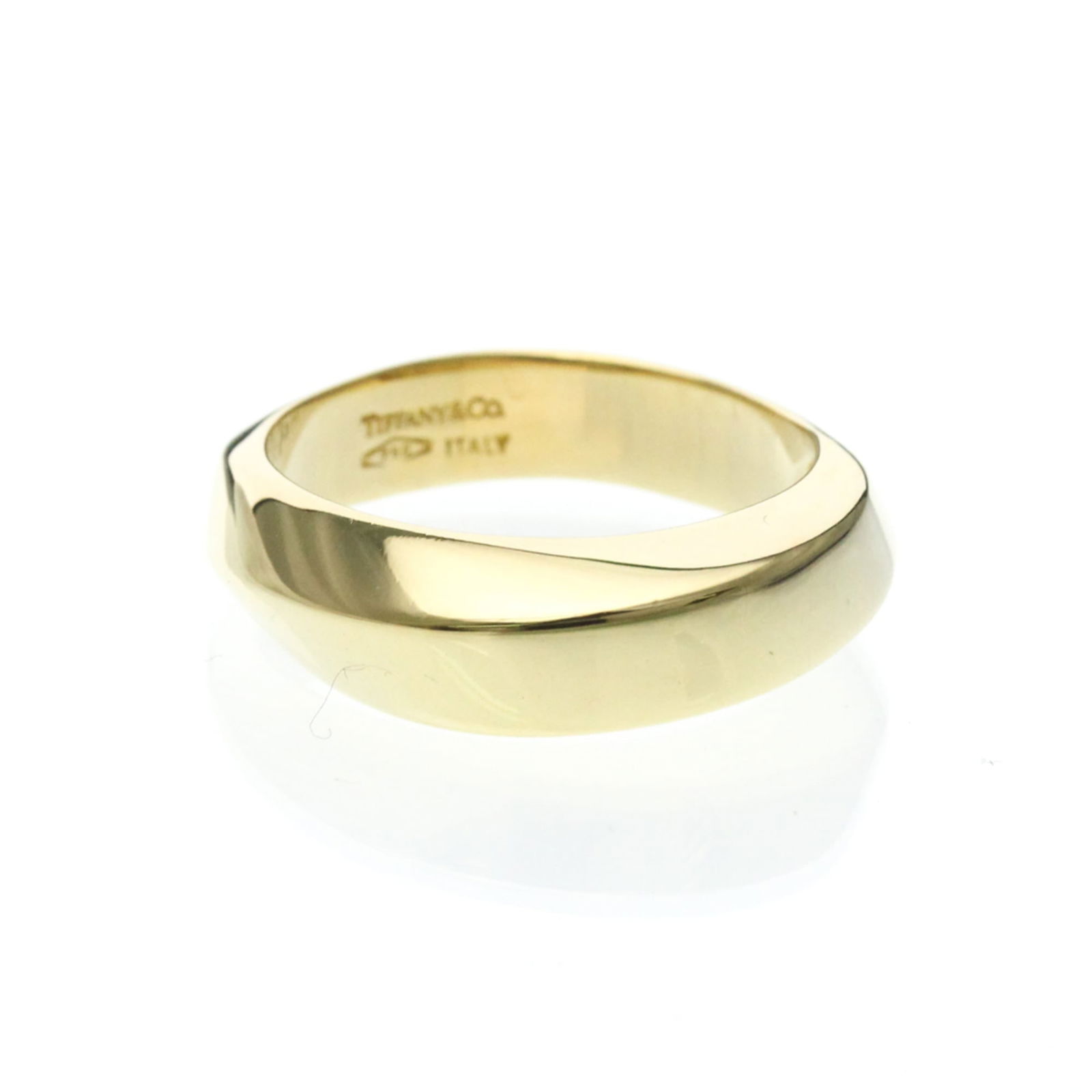 (18K) Tiffany Band Ring Yellow Gold: (18K) Tiffany Band Ring Yellow Gold This listing features (18K) Tiffany Band Ring Yellow Gold. Item specifics are provided below. Item Specifics: Brand: Tiffany Type: Band Ring Style: Fashion