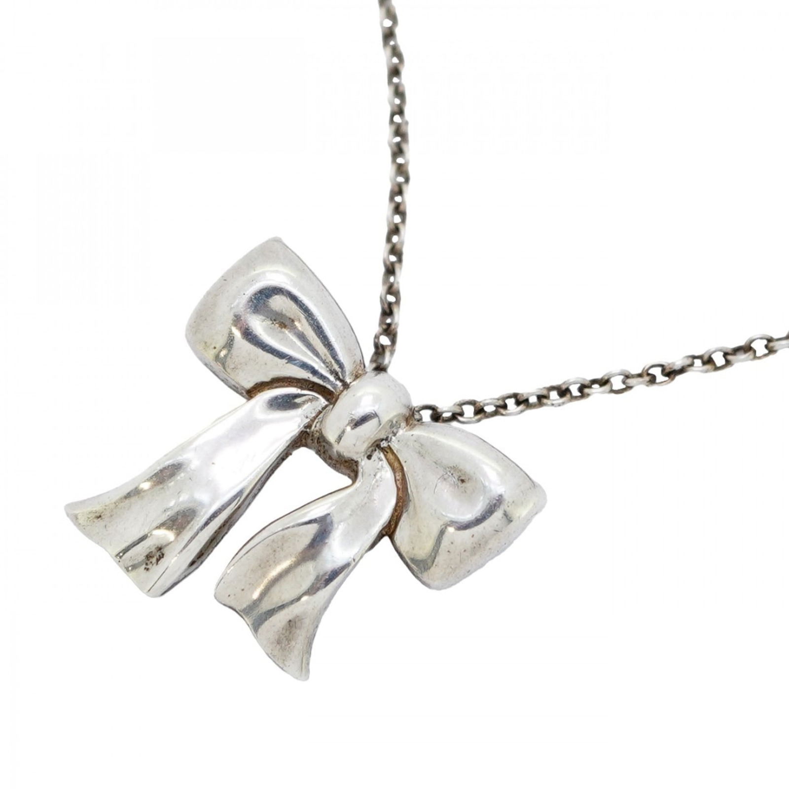 women Tiffany ribbon necklace in silver 925 for: women Tiffany ribbon necklace in silver 925 for This listing features women Tiffany ribbon necklace in silver 925 for. Item specifics are provided below. Item Specifics: Brand: Tiffany Necklace