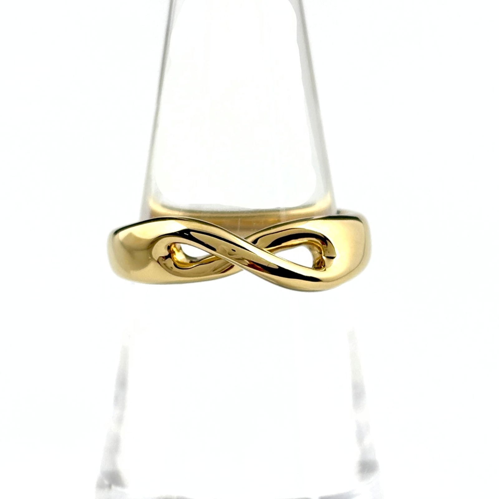 (18K) Tiffany Band Ring Yellow Gold: (18K) Tiffany Band Ring Yellow Gold This listing features (18K) Tiffany Band Ring Yellow Gold. Item specifics are provided below. Item Specifics: Brand: Tiffany Type: Band Ring Gender: Women Material: