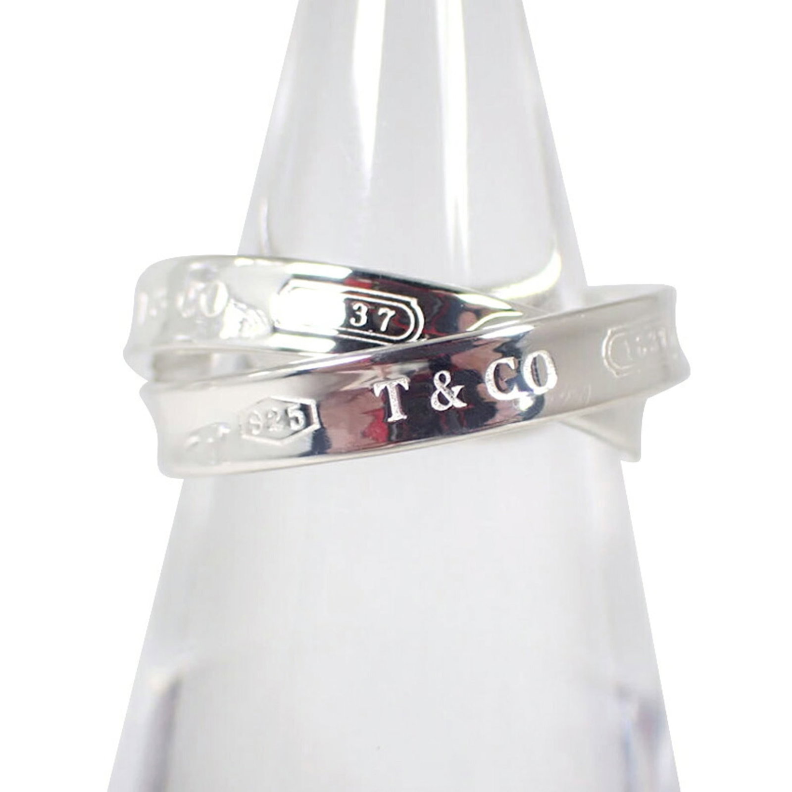 925 Tiffany Band Ring Sterling Silver: 925 Tiffany Band Ring Sterling Silver This listing features 925 Tiffany Band Ring Sterling Silver. Item specifics are provided below. Item Specifics: Brand: Tiffany Type: Band Ring Gender: Women