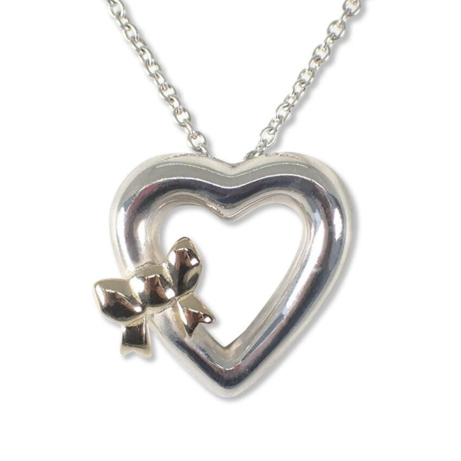 Necklace TIFFANY 925 750 Heart Ribbon Pendant: Necklace TIFFANY 925 750 Heart Ribbon Pendant This listing features Necklace TIFFANY 925 750 Heart Ribbon Pendant. Item specifics are provided below. Item Specifics: Brand: Tiffany Necklace Type: