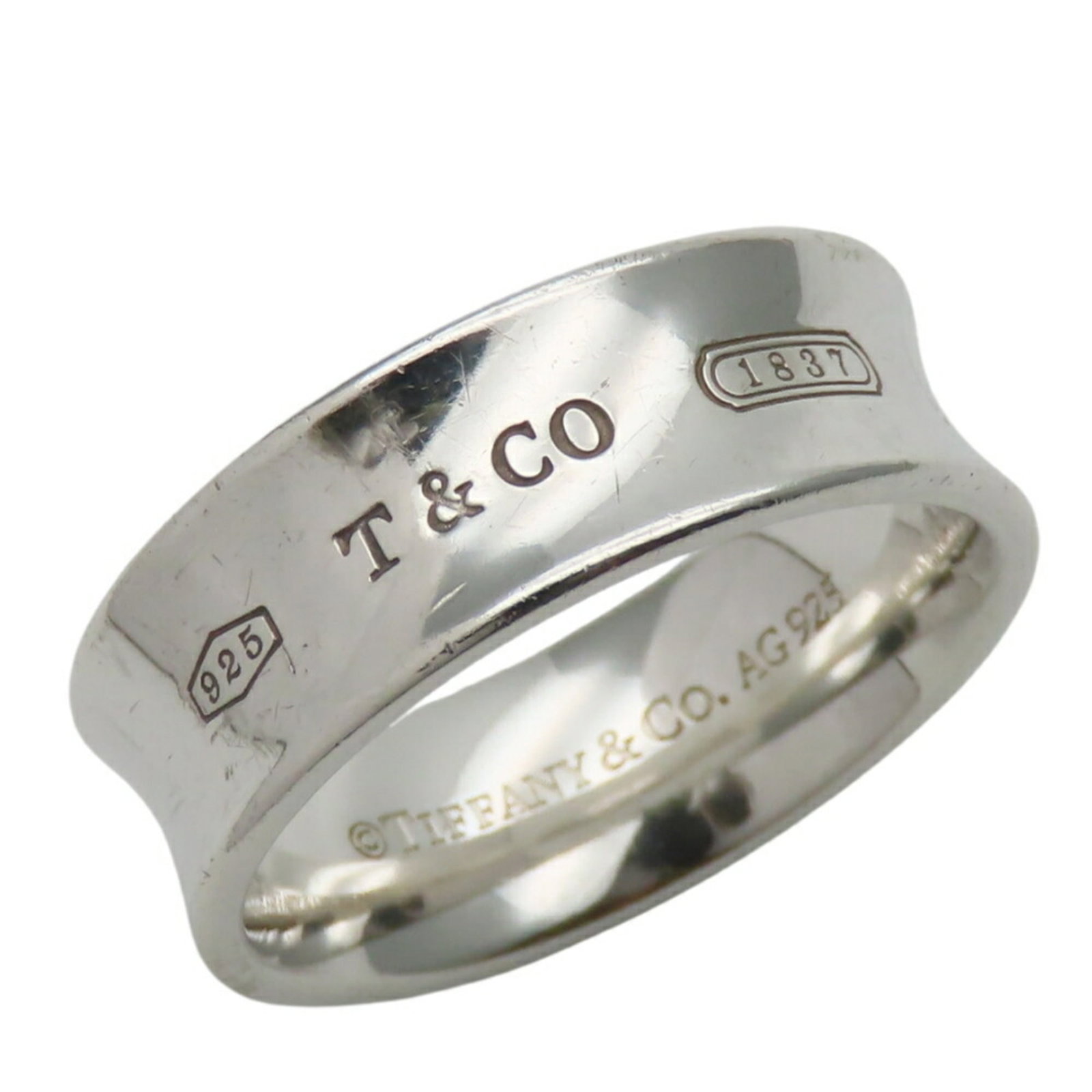 925 Tiffany Band Ring Silver: 925 Tiffany Band Ring Silver This listing features 925 Tiffany Band Ring Silver. Item specifics are provided below. Item Specifics: Brand: Tiffany Type: Band Ring Gender: Women Color: Silver Material:
